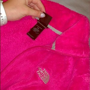 bright pink north face jacket
